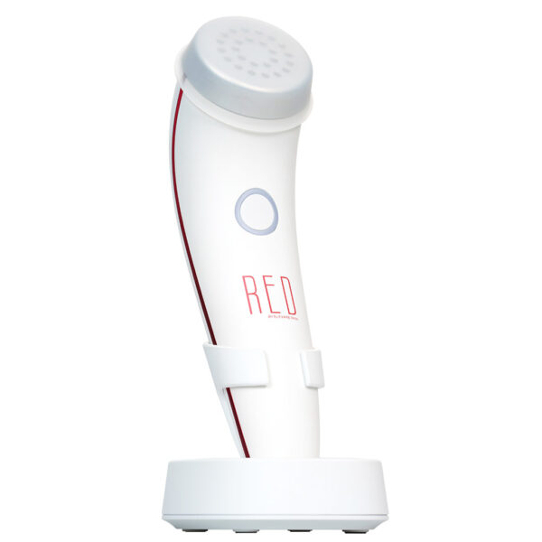 RED by Elevare Skin with silicon cap in charging base, shown at an angle